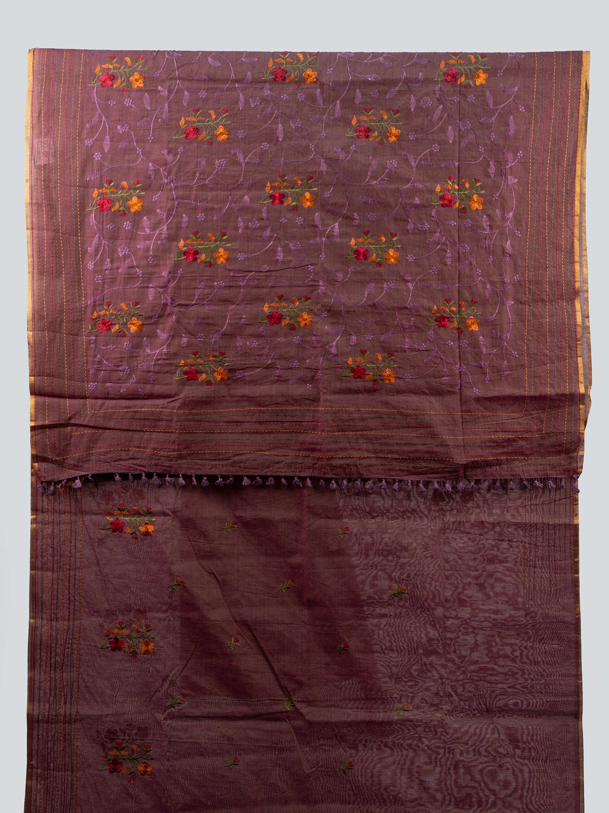 Mauve linen cotton saree with floral thread embroidery, gold zari kantha-stitch border and contrast black blouse