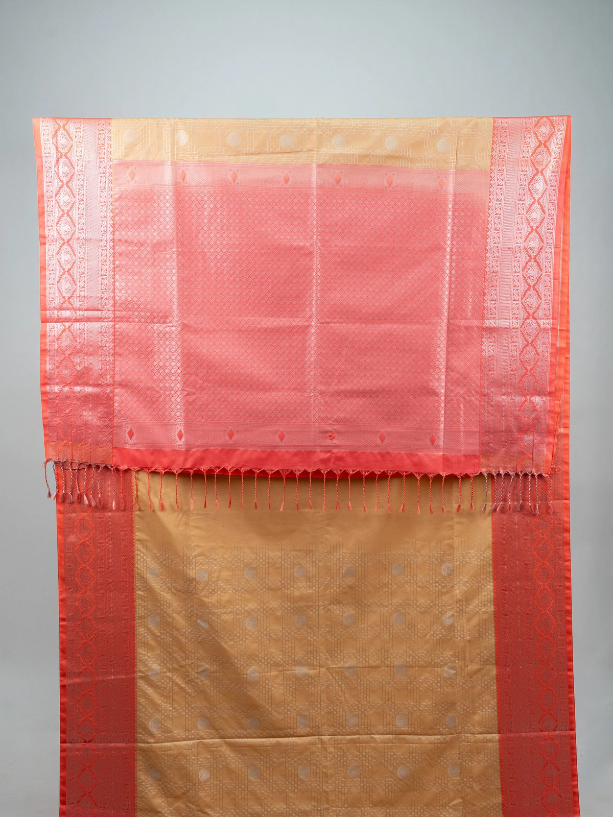 Beige semi silk saree with coral silver zari border and Vaira Oosi Design woven buttas