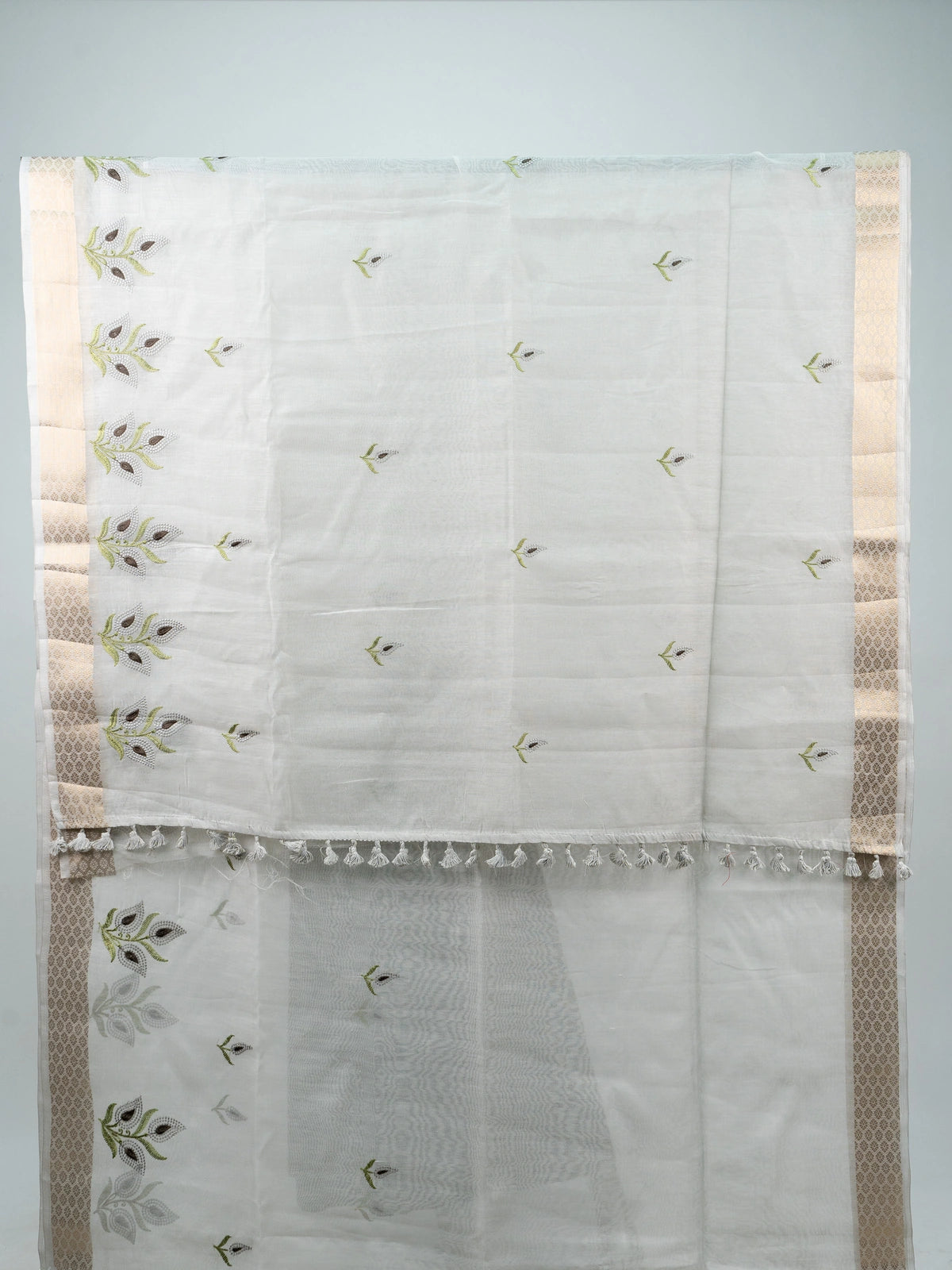 White linen cotton saree with gold zari border, embroidered leaf buttas and contrast black blouse
