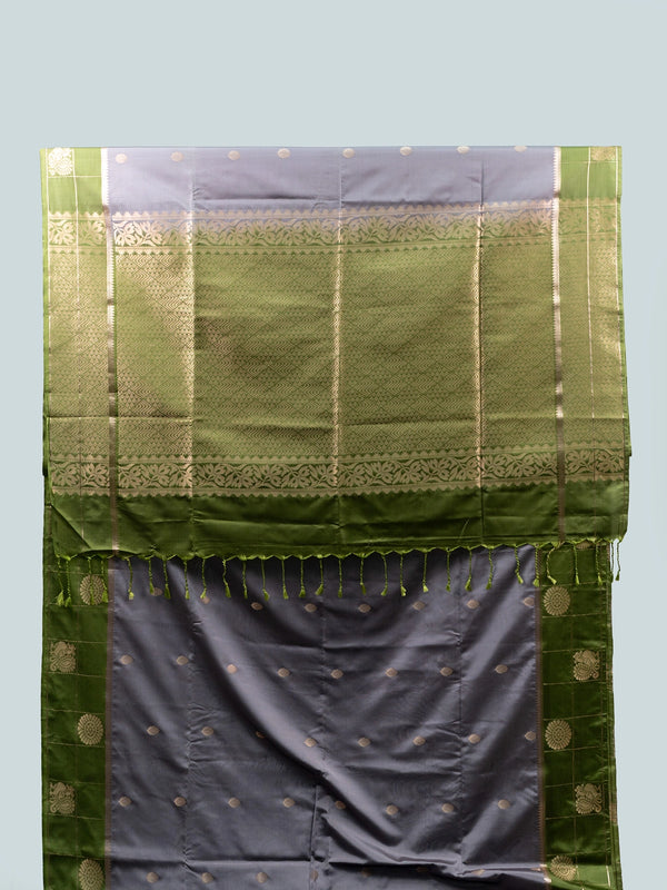 Grey semi silk saree with green contrast gold zari border and floral pallu
