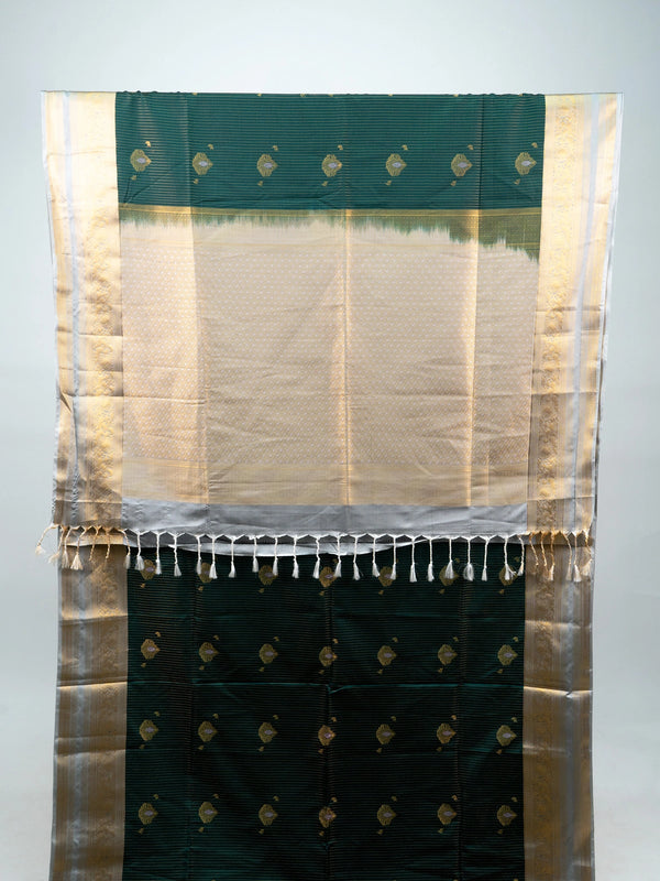 Bottle green Vaira Oosi Design semi silk saree with silver-gold zari border and contrast cream pallu