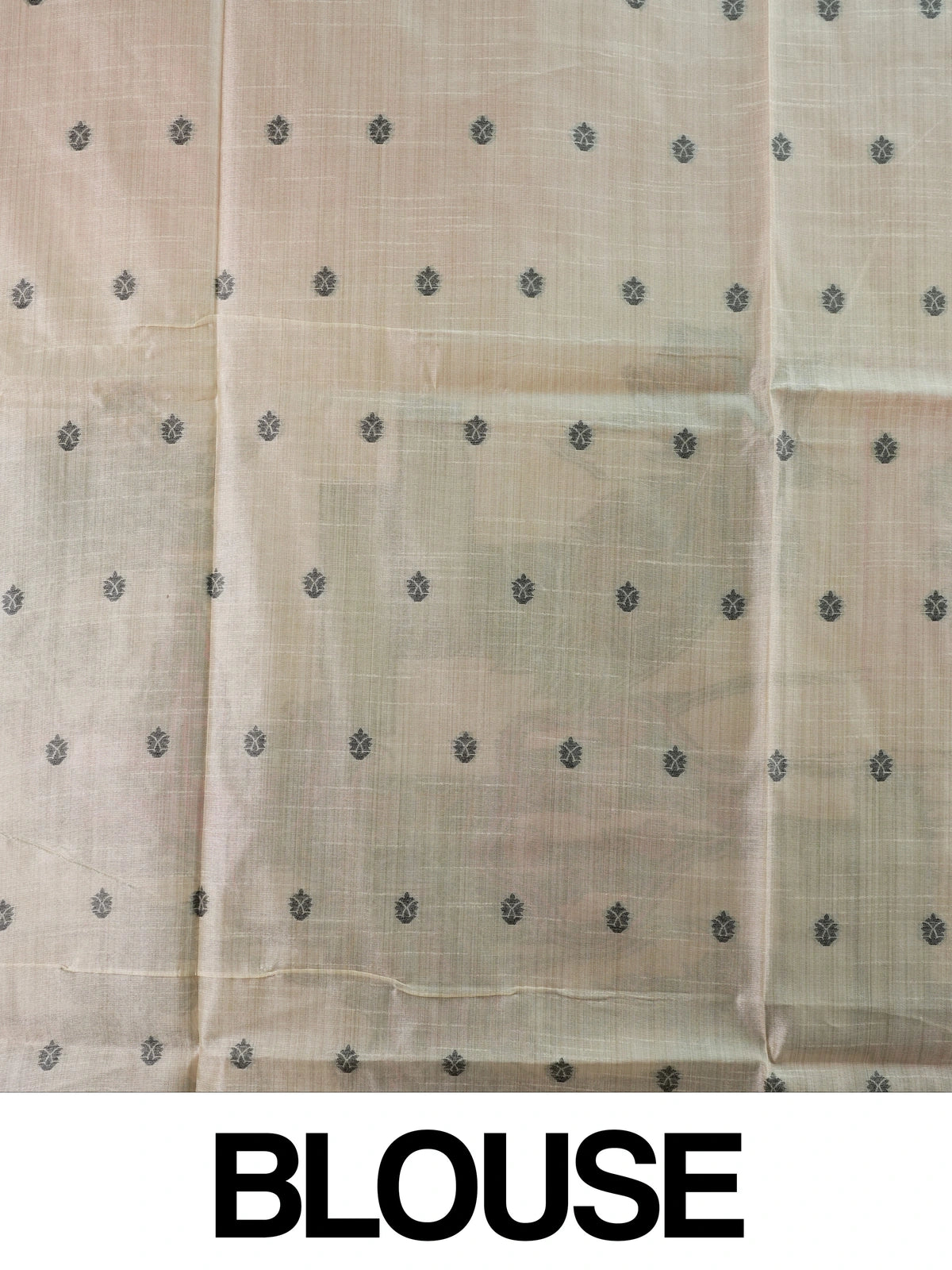 Dusty rose pink linen cotton saree with cream floral buttas, contrast scroll border and printed kalamkari pallu