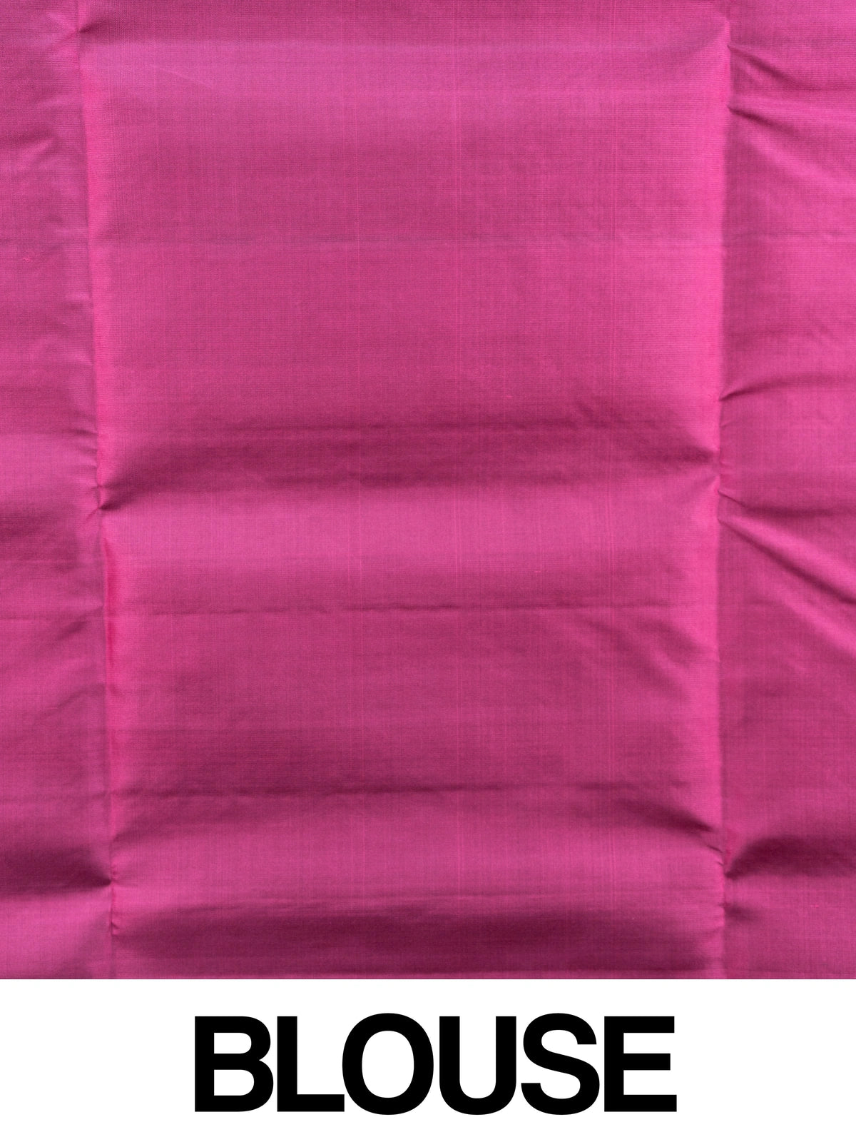 Bottle green soft silk saree with contrast pink zari border and tasselled pallu