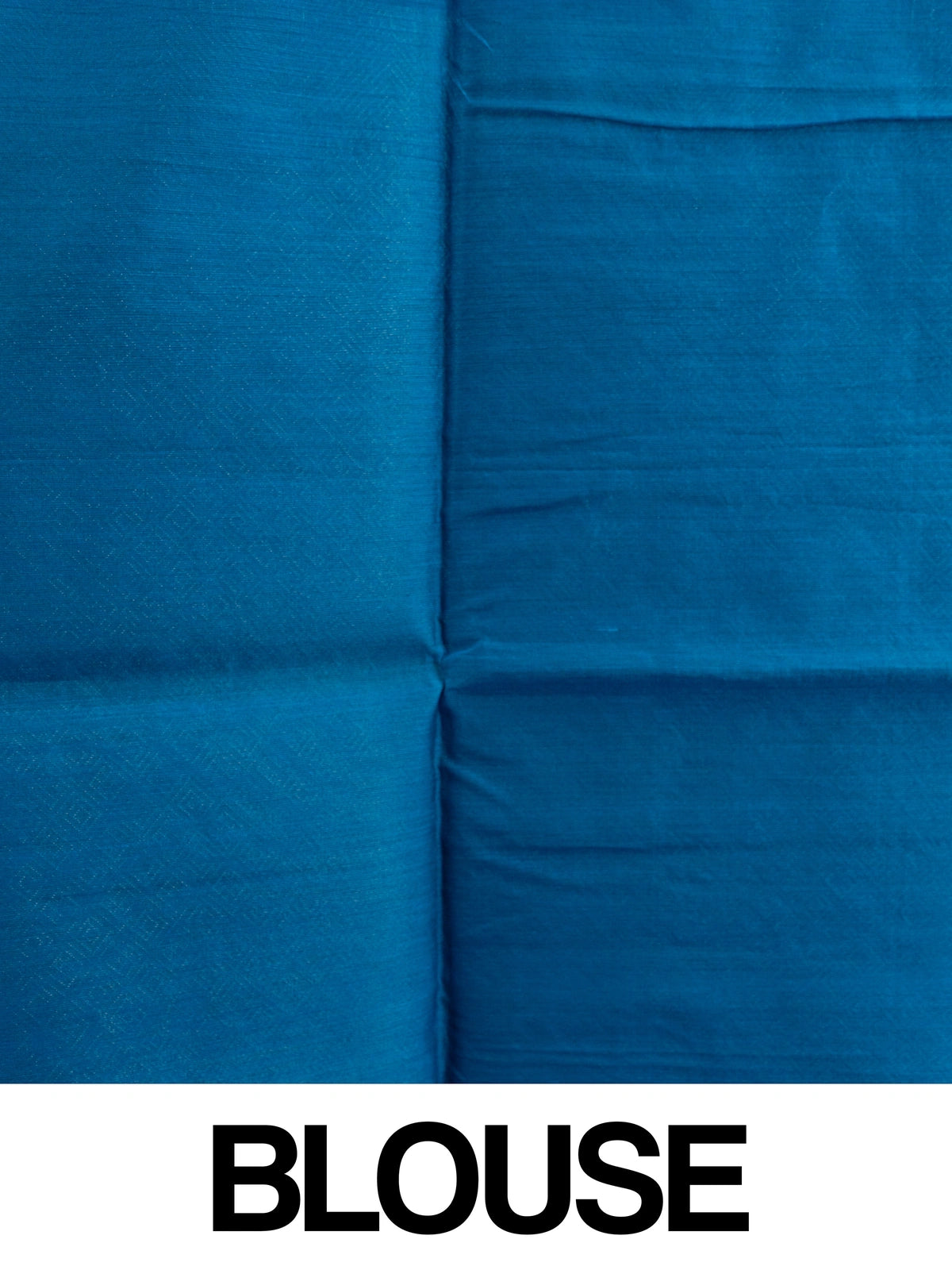 Peacock blue silk cotton saree with silver zari floral buttas and diamond-patterned border