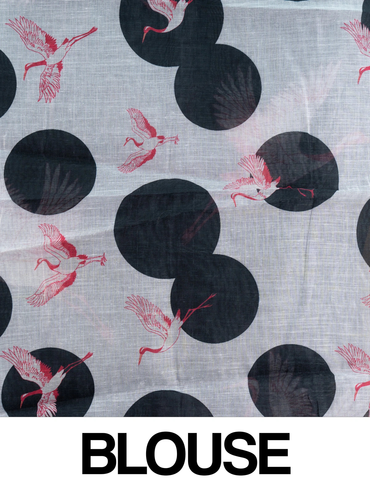 Black linen cotton saree with red and white crane prints, tonal circle motifs and a silver zari border
