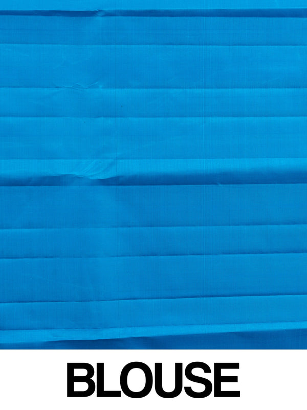 Royal blue pure Kanchipuram silk saree with turquoise and gold zari border and woven peacock motifs