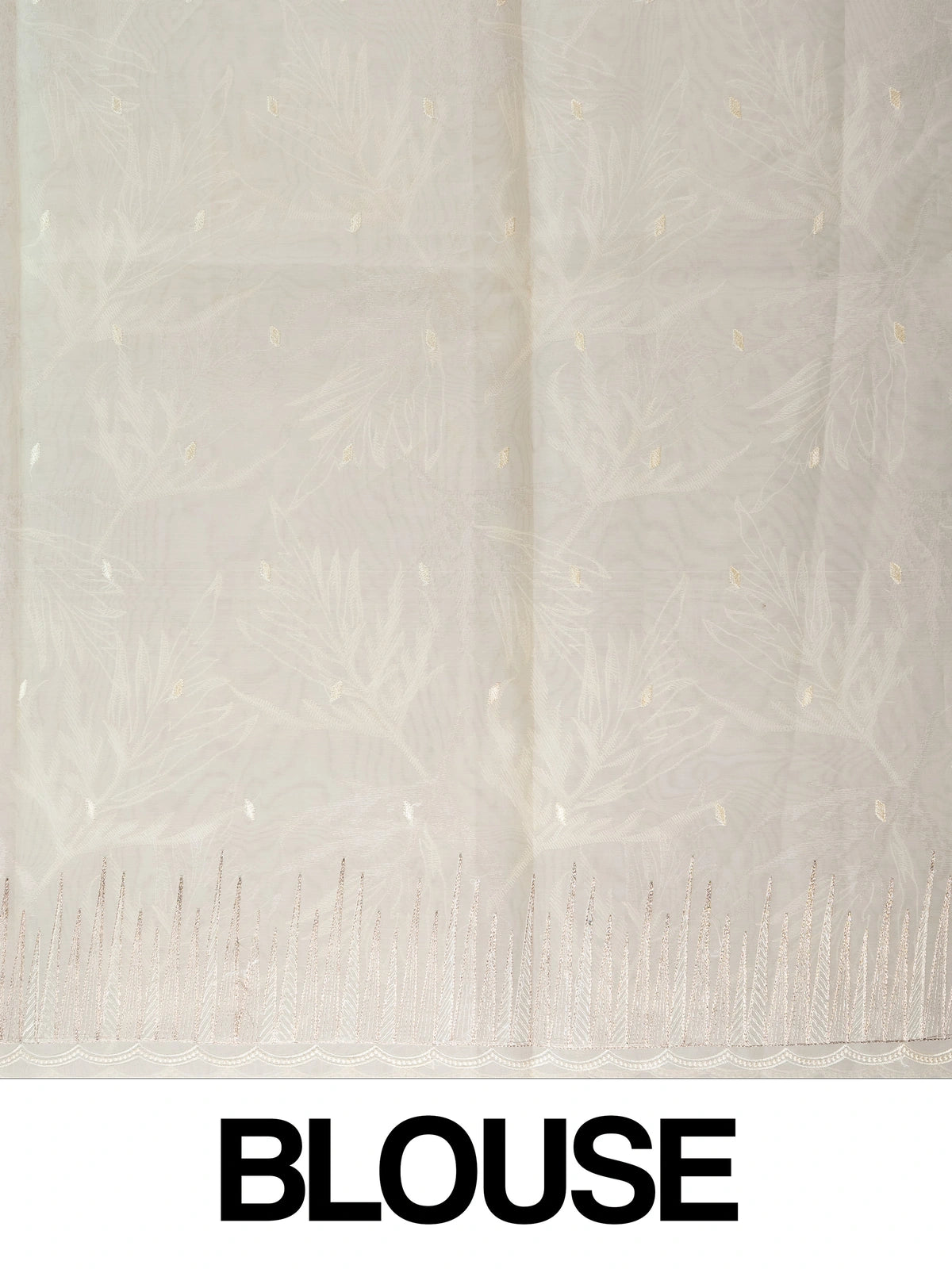 Cream organza designer saree with gold leaf embroidery and scalloped border