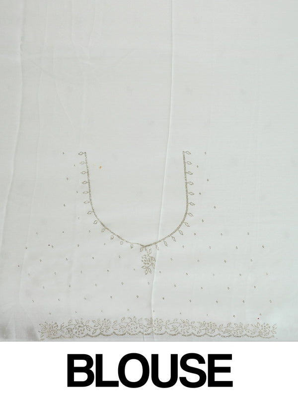 Off-white georgette designer saree with silver floral buttas and scalloped embellished border