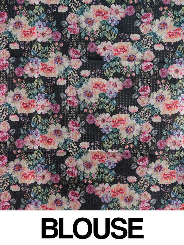 Black semi tussar saree with multicolour floral printed border and pallu on a cream ground