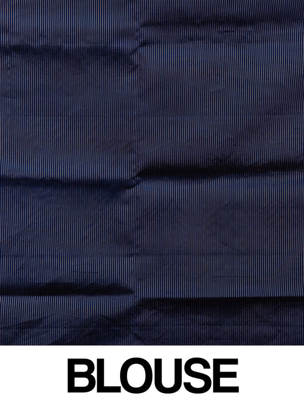 Mustard yellow soft silk saree with navy blue gold zari border and floral pallu