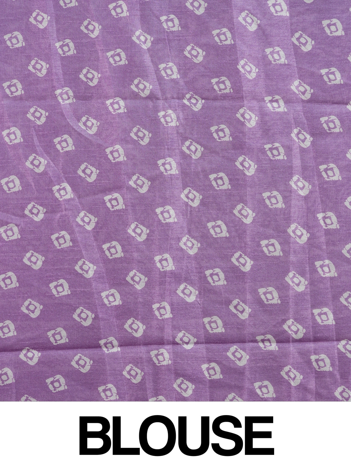 Lavender and white designer saree with batik-style print and zari border