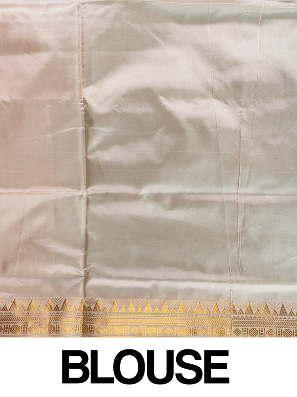 Green Banana Silk saree with gold temple zari border, paisley buttas and contrasting cream pallu