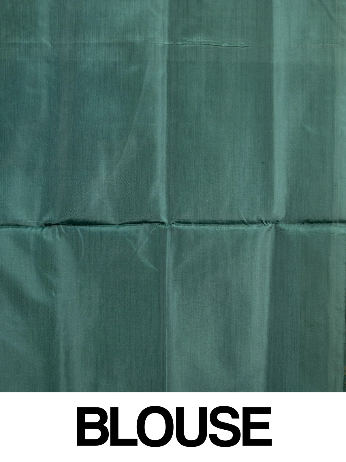 Mustard banana silk saree with contrast bottle-green border, gold zari buttas and striped tasselled pallu