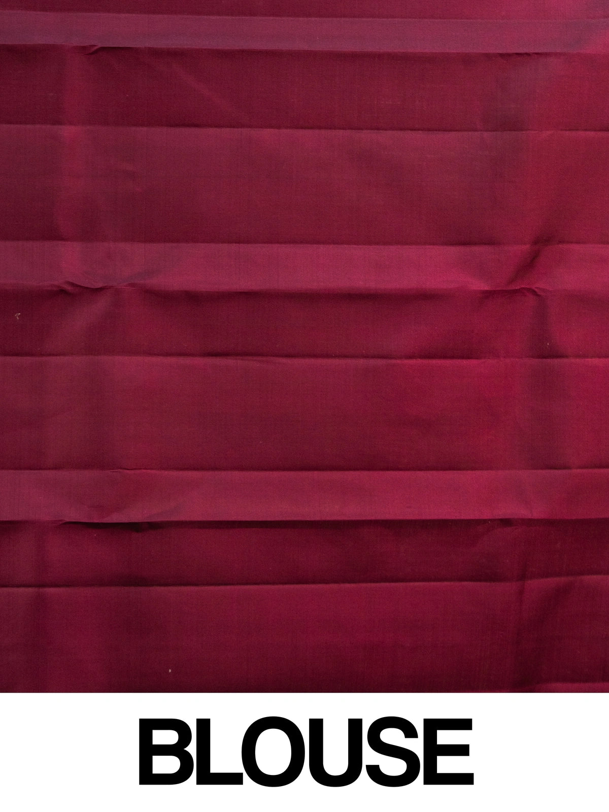 Maroon pure Kanchipuram silk saree with gold zari border, buttas and ornate woven pallu
