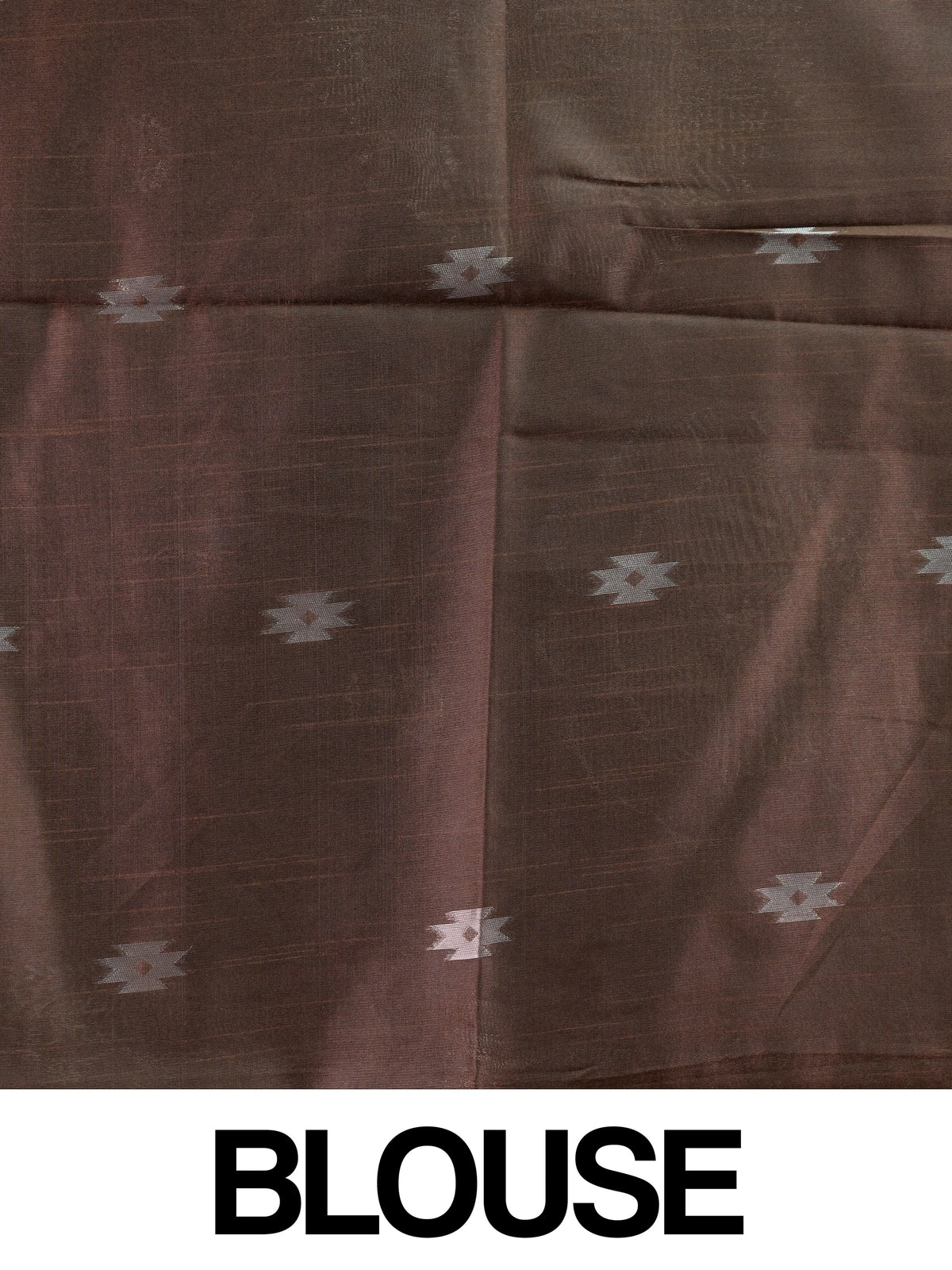 Brown semi tussar saree with gold and silver zari buttas, temple border and floral medallion pallu