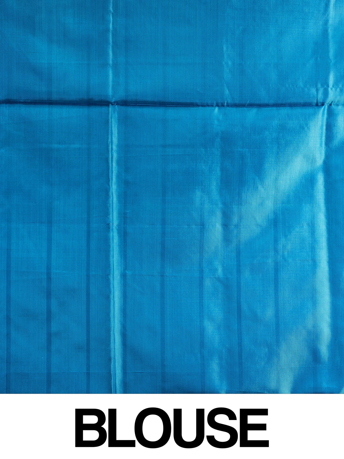 Purple and blue checked banana silk saree with contrast blue border and silver zari paisley pallu