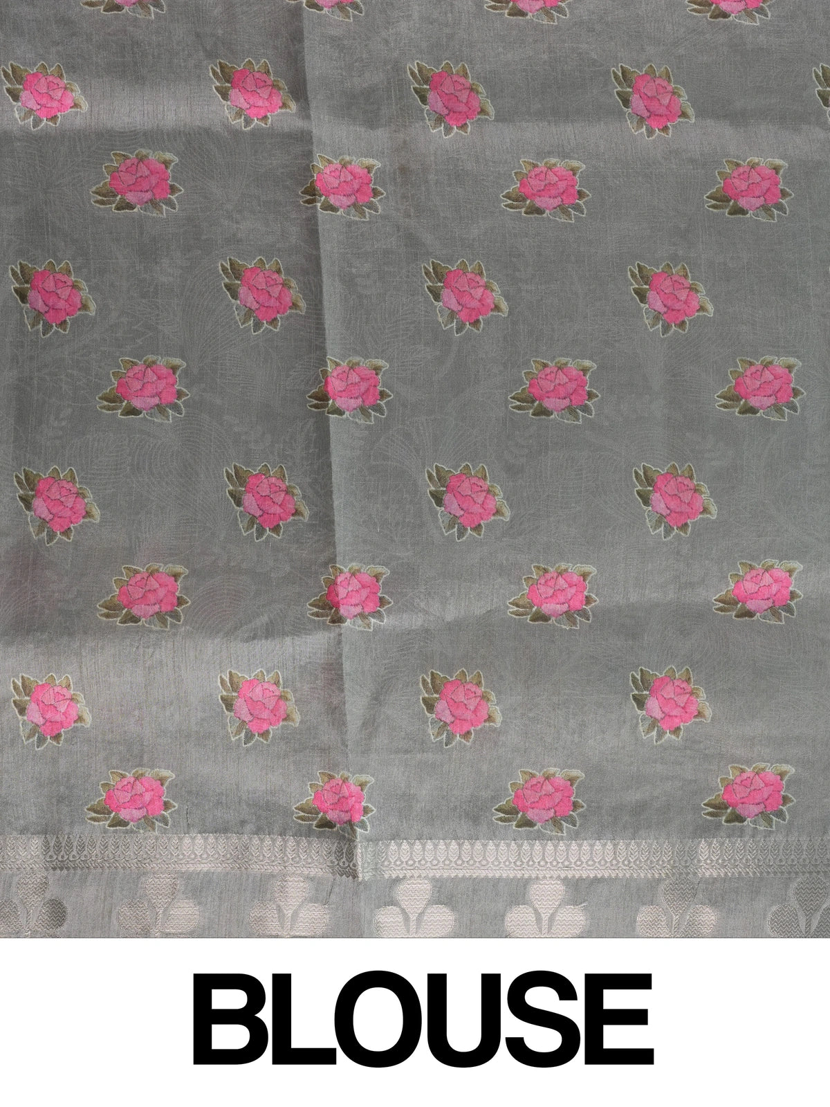 Grey designer saree with white floral embroidery, silver zari border and multicoloured embroidered roses