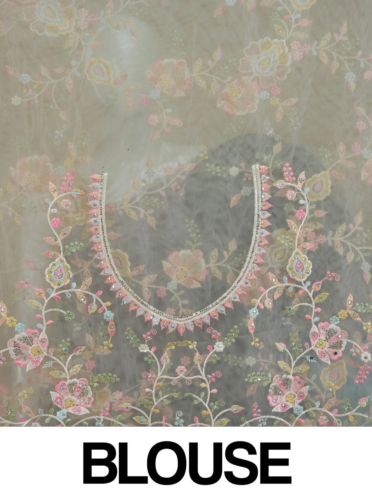 Cream net designer saree with pastel multicolour floral embroidery and scalloped border