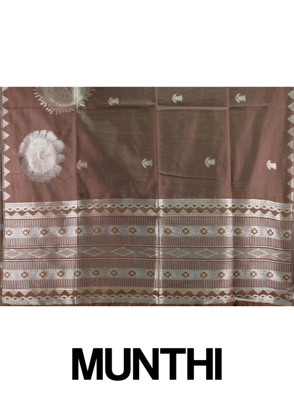 Brown semi tussar saree with gold and silver zari buttas, temple border and floral medallion pallu