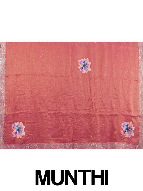 Pink and gold designer tissue saree with scattered stone work, multicolour floral prints and a stone-studded scalloped border.