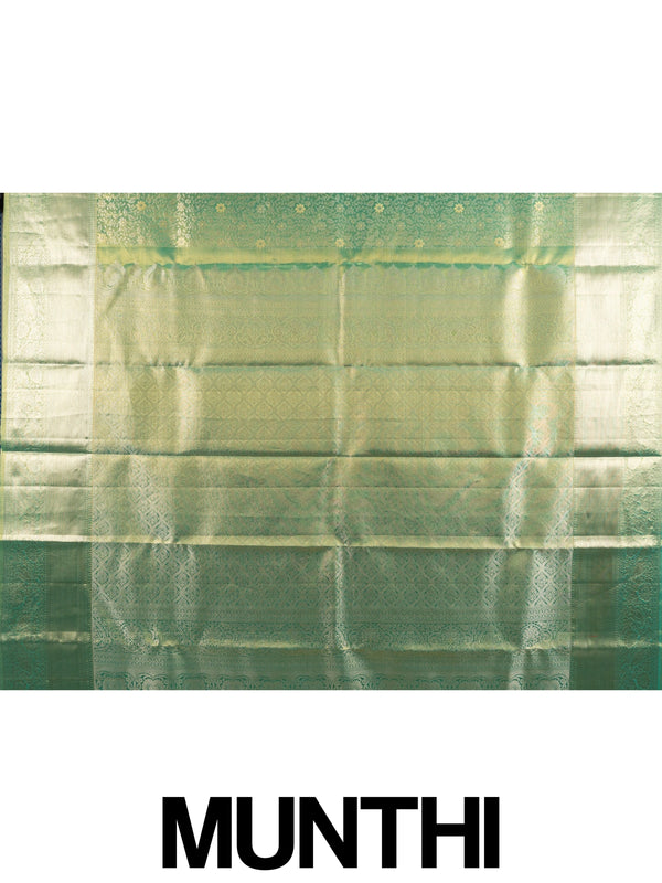 Green pure Kanchipuram silk saree with all-over gold zari floral jaal and broad zari border