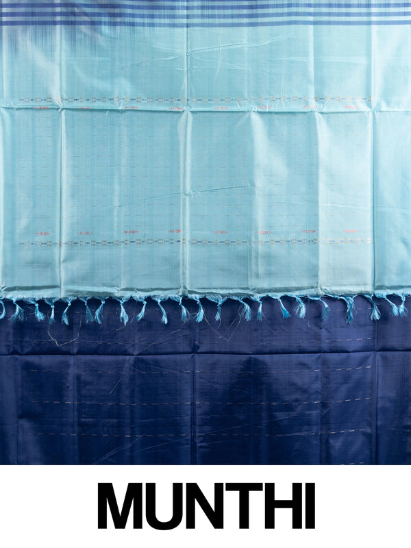 Navy blue banana silk saree with sky-blue contrast pallu, zari stripes and striped border