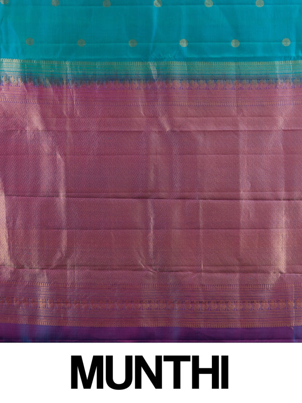 Teal blue pure Kanchipuram silk saree with contrast magenta border and gold zari buttas