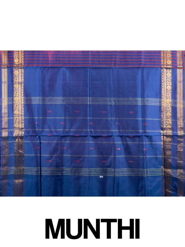 Pink banana silk saree with royal blue contrast pallu and gold zari peacock border