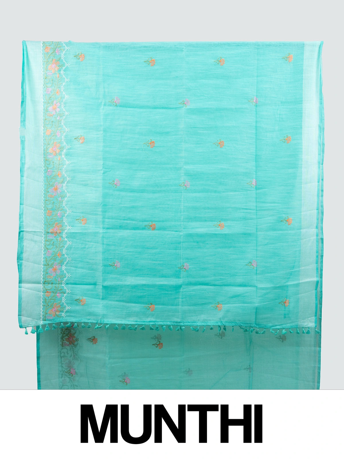 Aqua turquoise linen cotton saree with floral embroidery buttis, silver zari border and embroidered floral pallu