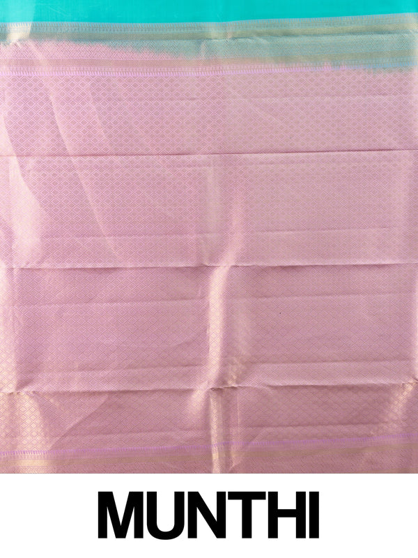 Teal green pure Kanchipuram silk saree with lavender contrast border and gold zari buttas