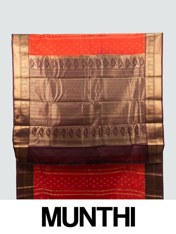Orange semi silk saree with maroon contrast border and gold zari peacock pallu