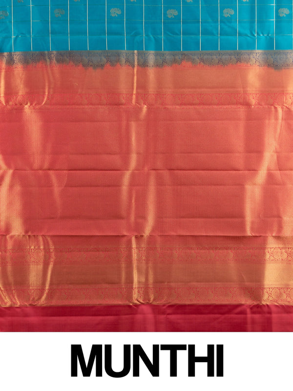 Peacock blue pure Kanchipuram silk saree with gold zari checks, peacock motifs and contrast pink zari border