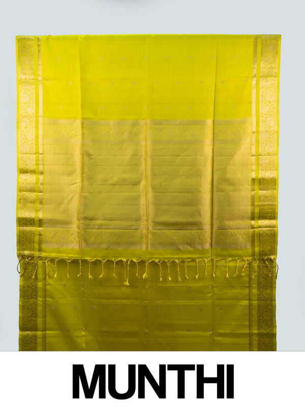 Lime green soft silk saree with broad gold zari border and ornate zari pallu