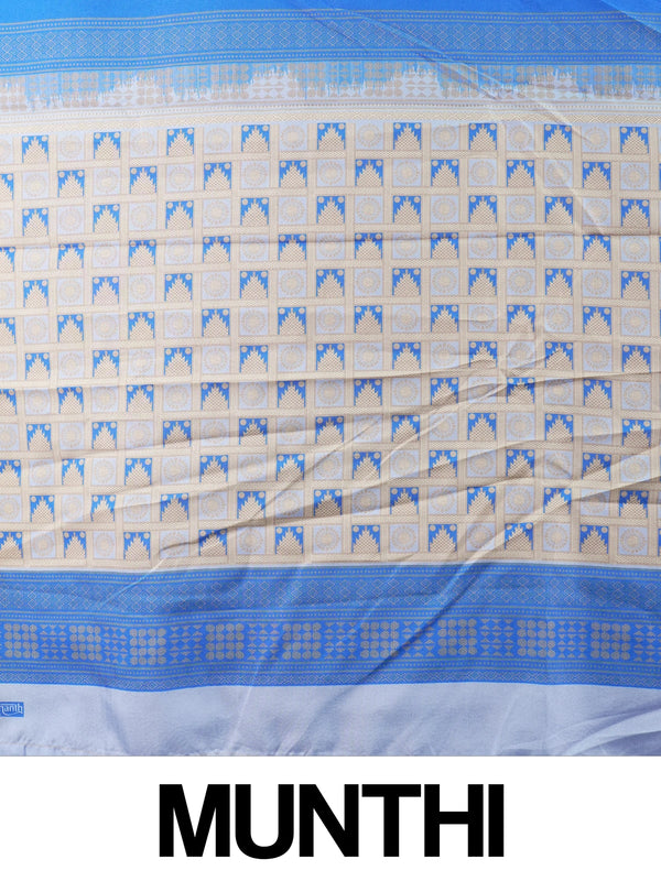 Blue Dola silk saree with white floral buti motifs and contrast zari border