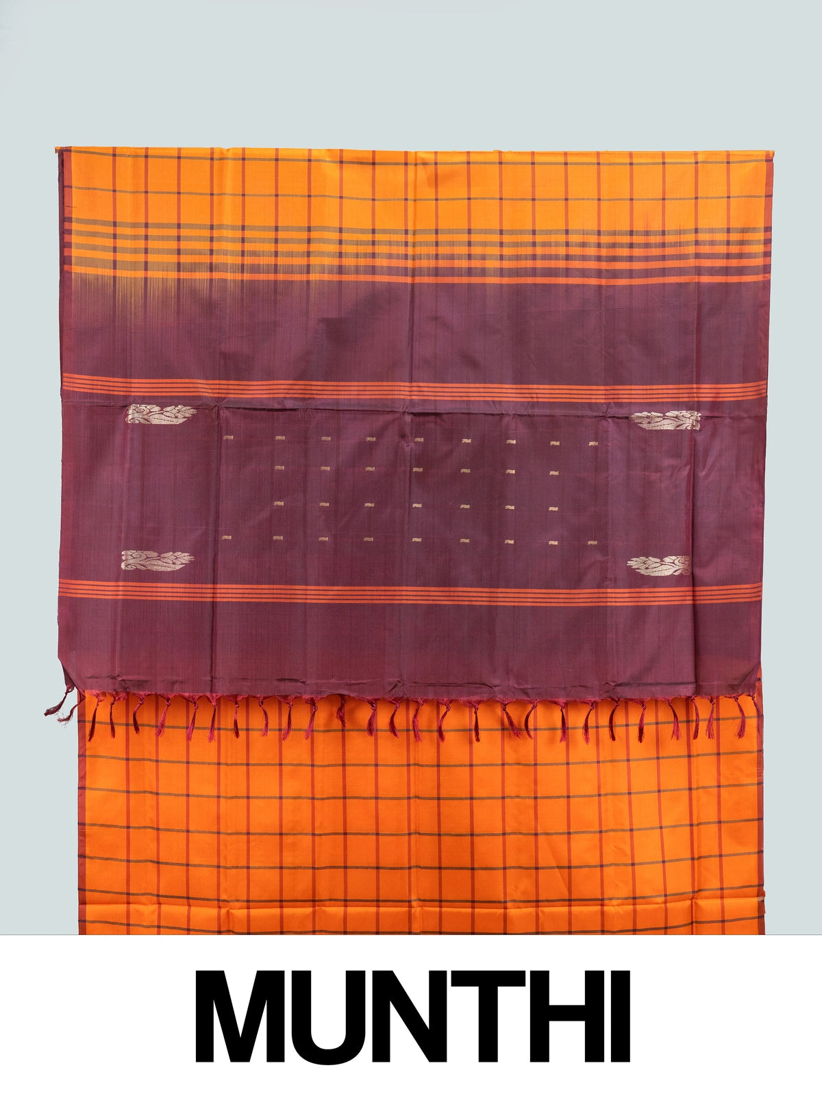 Orange checked banana silk saree with contrast maroon border and gold zari motif pallu