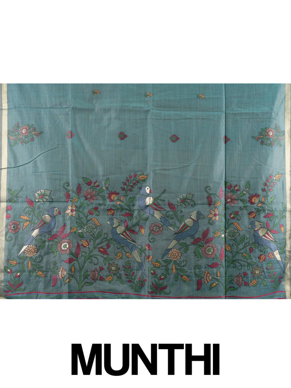 Teal blue linen cotton saree with floral butta body, gold zari border and parrot motif pallu