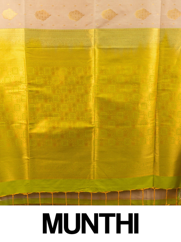 Beige semi silk saree with lime green gold zari contrast border and zari pallu