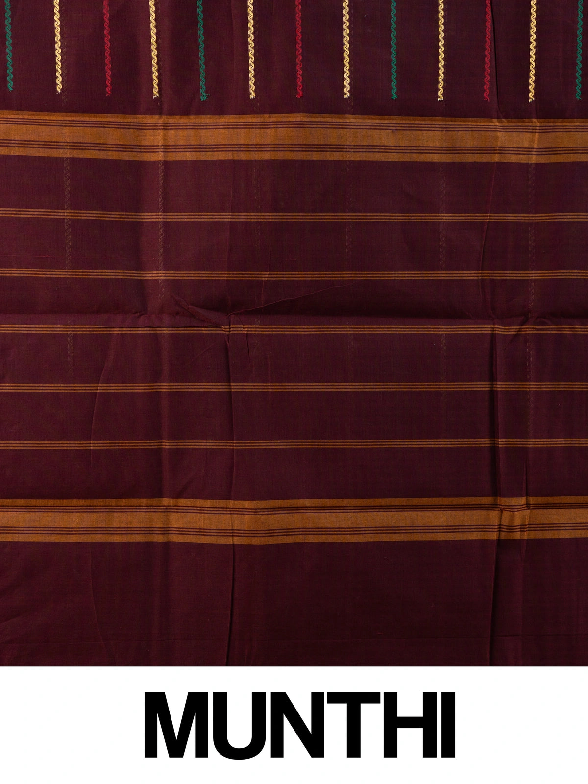 Maroon Chettinad cotton saree with gold zari stripes and green temple border