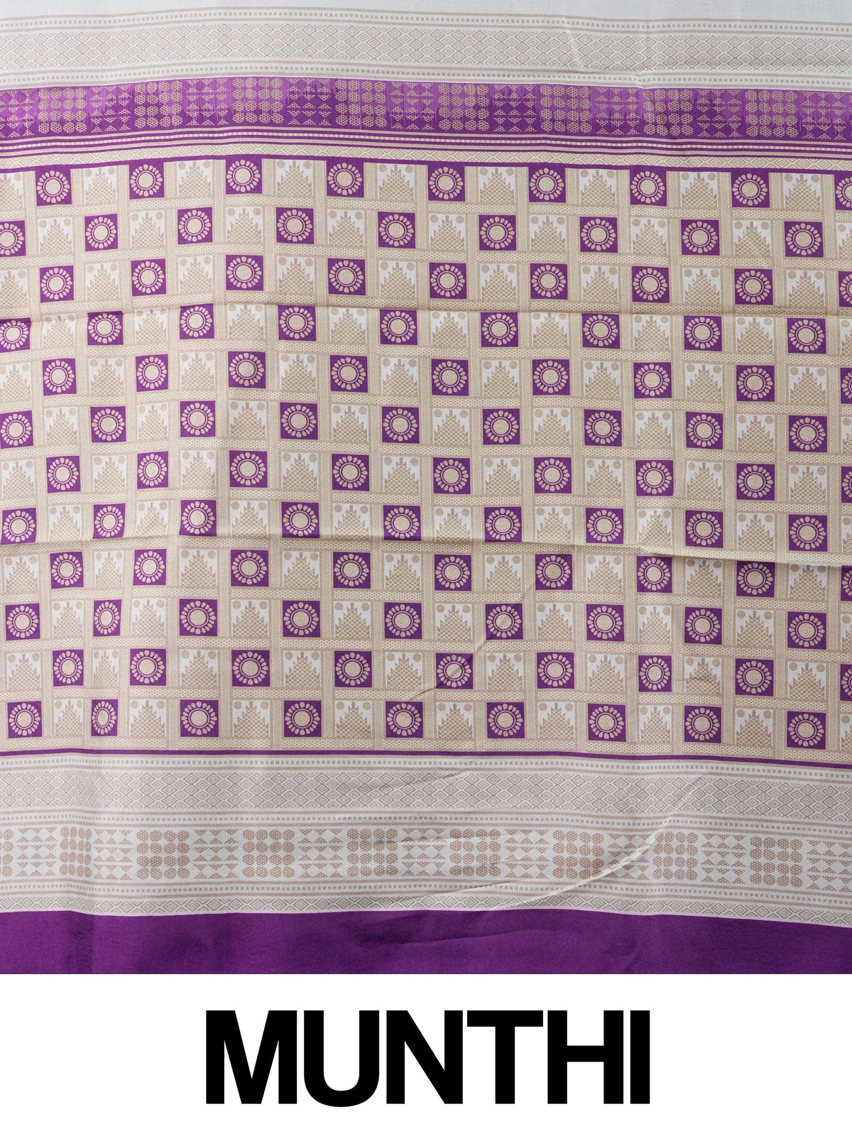 Cream Dola silk saree with purple floral buttas, gold zari contrast border and patterned purple pallu