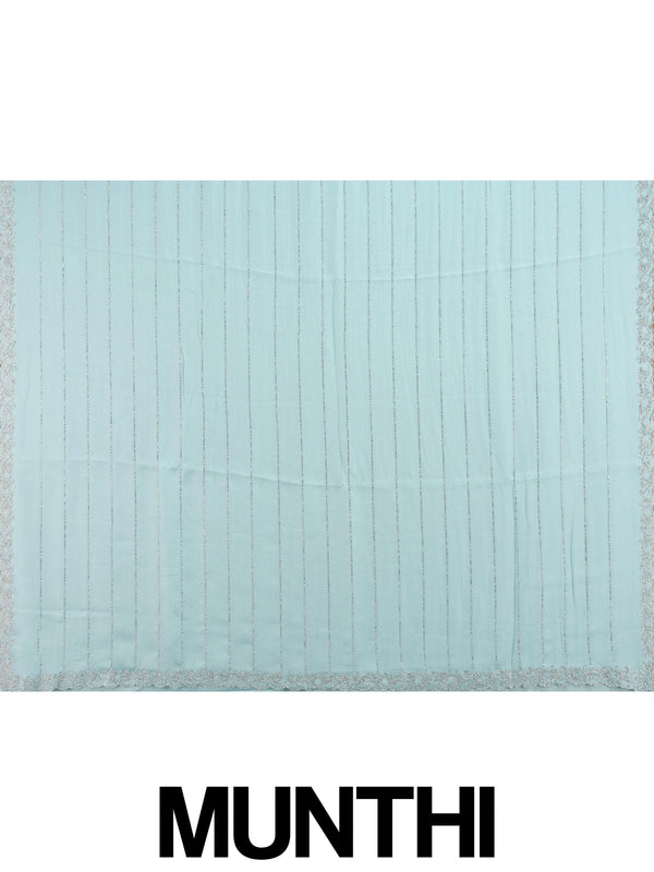 Sky blue designer georgette saree with silver sequin stripes and contrast yellow embroidered blouse