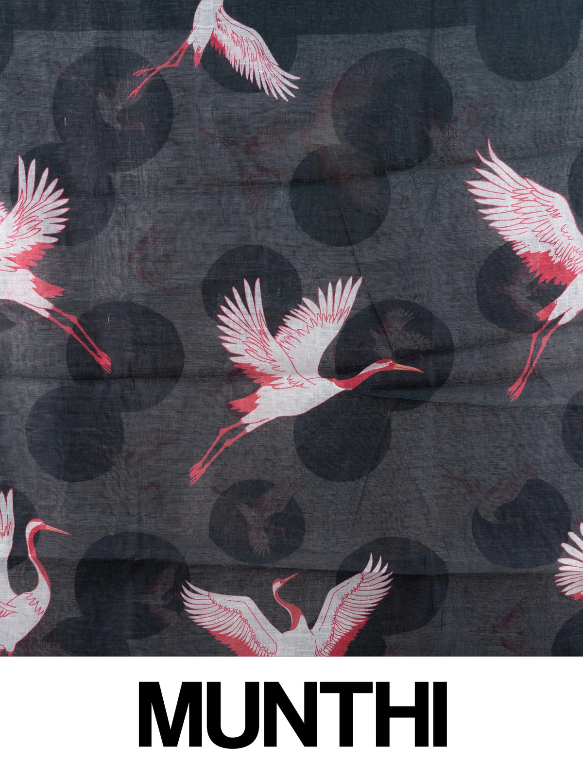 Black linen cotton saree with red and white crane prints, tonal circle motifs and a silver zari border