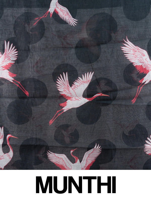 Black linen cotton saree with red and white crane prints, tonal circle motifs and a silver zari border