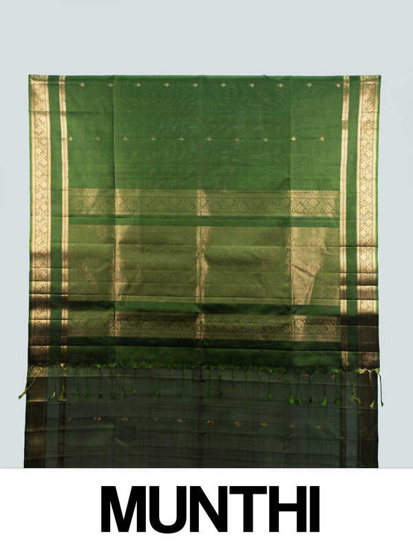 Dark green soft silk saree with gold zari floral border and buttis