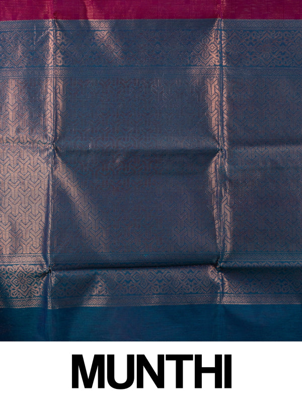 Magenta silk cotton saree with gold zari stripes and contrast blue zari border and pallu