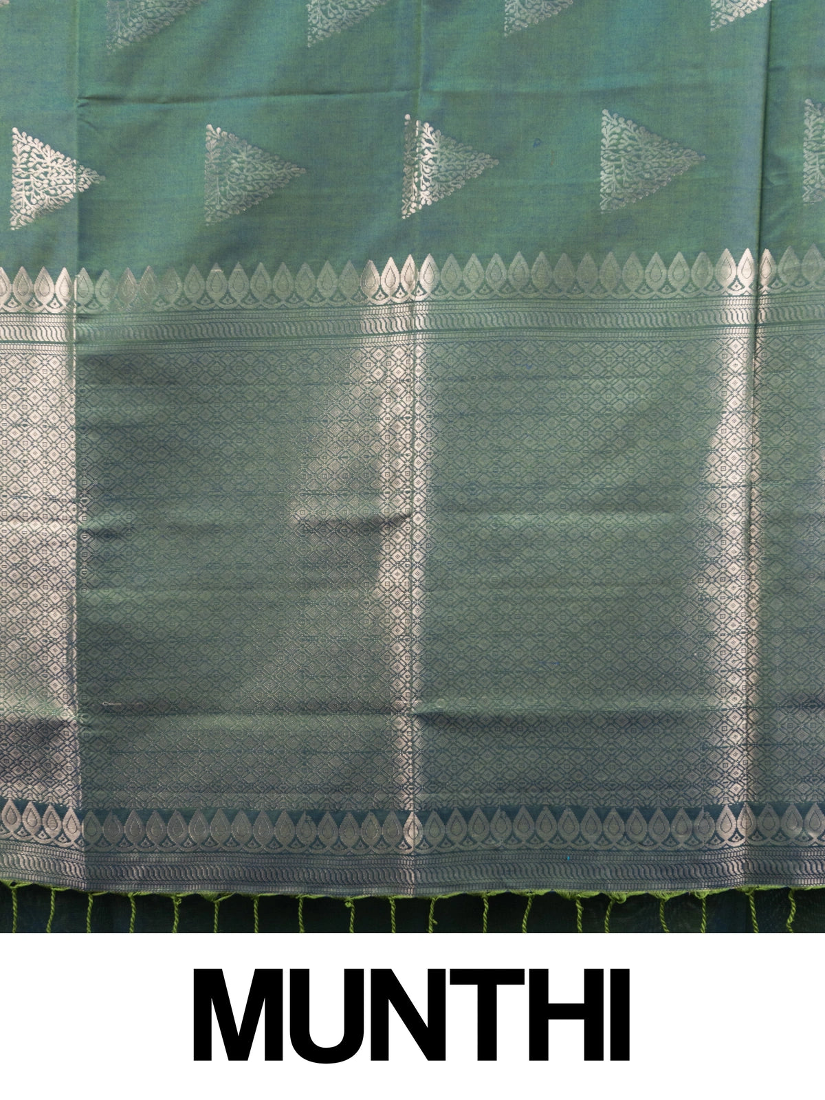 Green Kanchipuram fancy silk saree with contrast purple silver zari border and triangular zari buttas