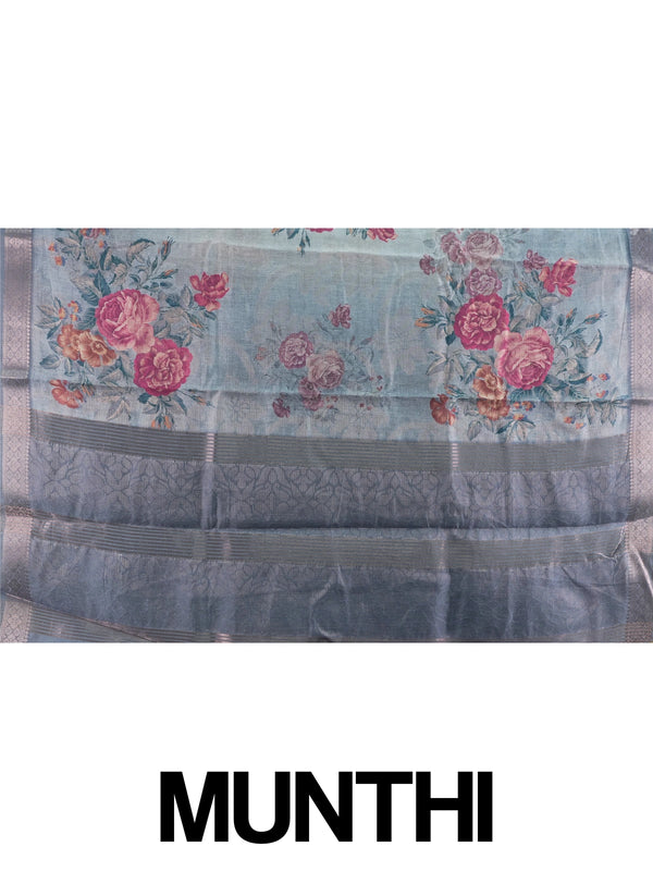 Grey semi tussar saree with pink floral prints and silver zari border