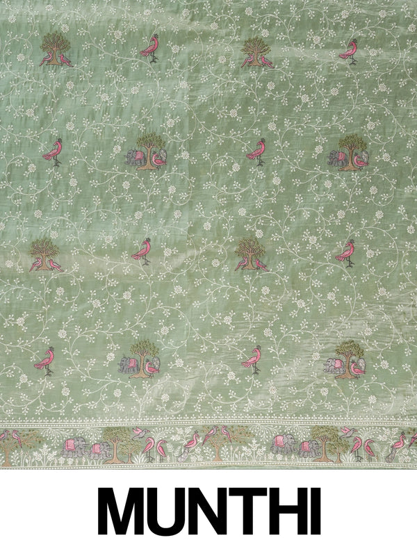 Sage green designer saree with white floral embroidery, pink bird and elephant motifs and pom-pom lace border