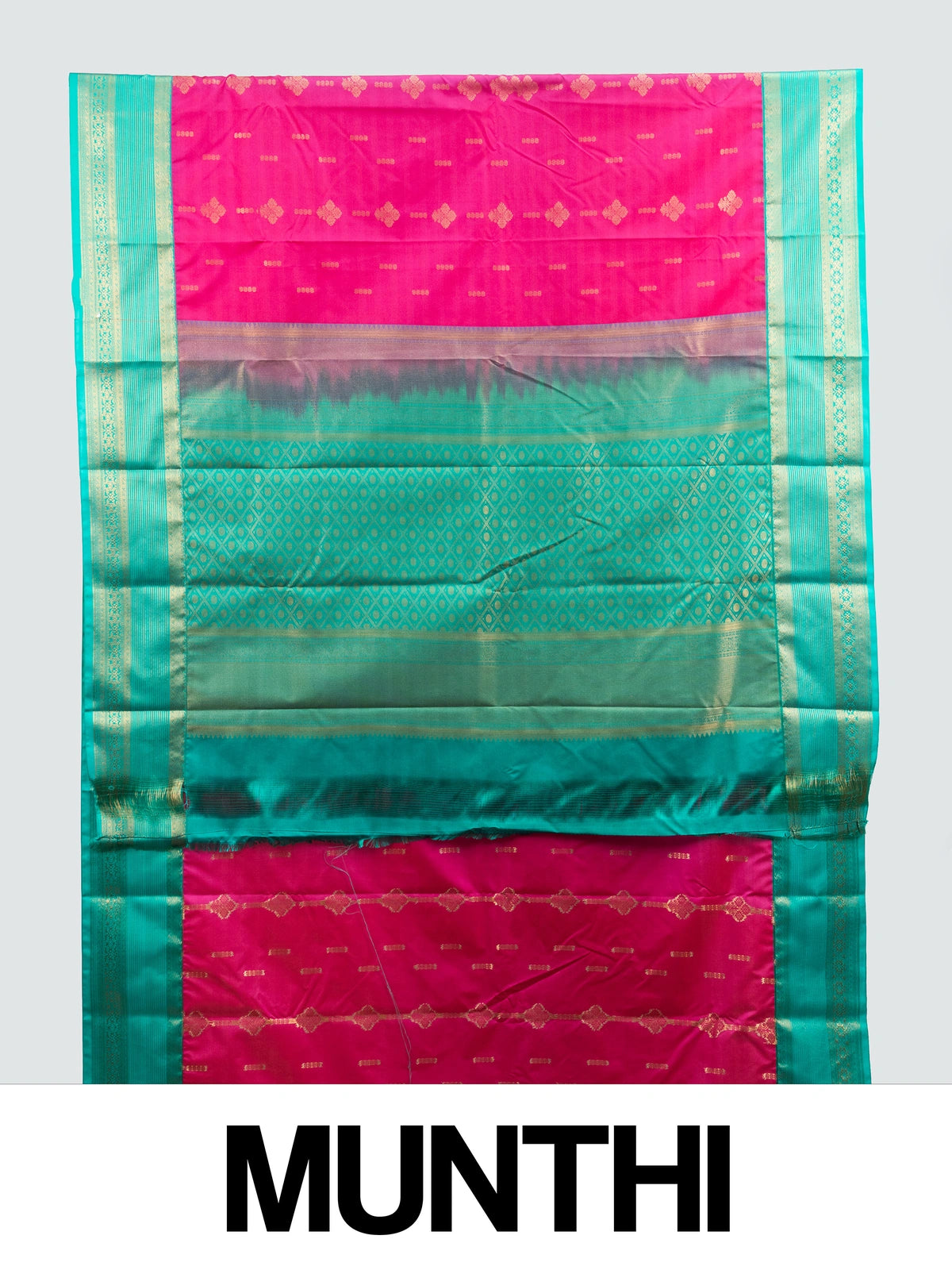 Rani pink Kanchipuram fancy silk saree with teal green contrast border, gold zari buttas and diamond-grid zari pallu