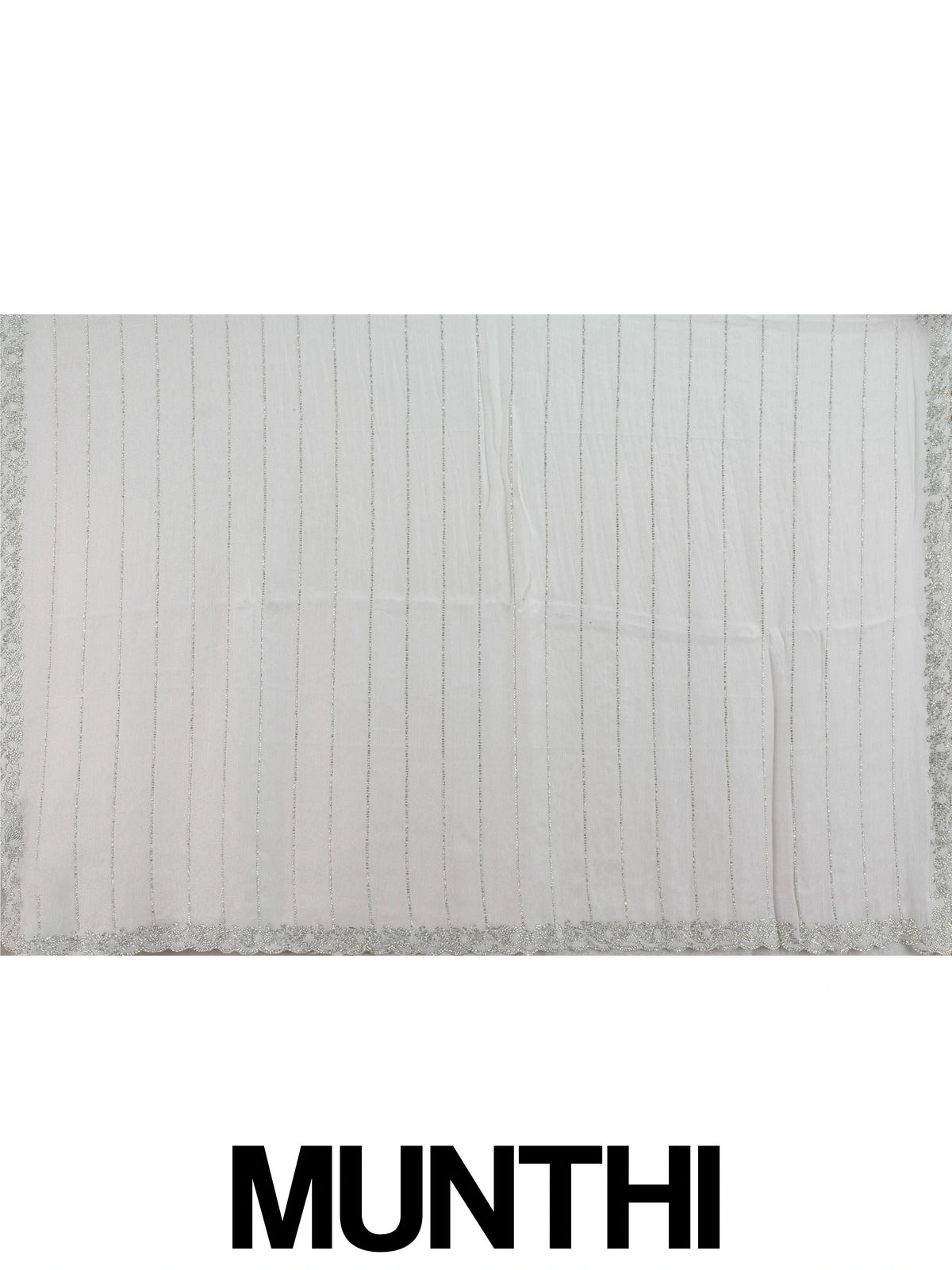 Light grey sheer designer saree with silver stone stripes and scalloped border, styled with a yellow embroidered blouse