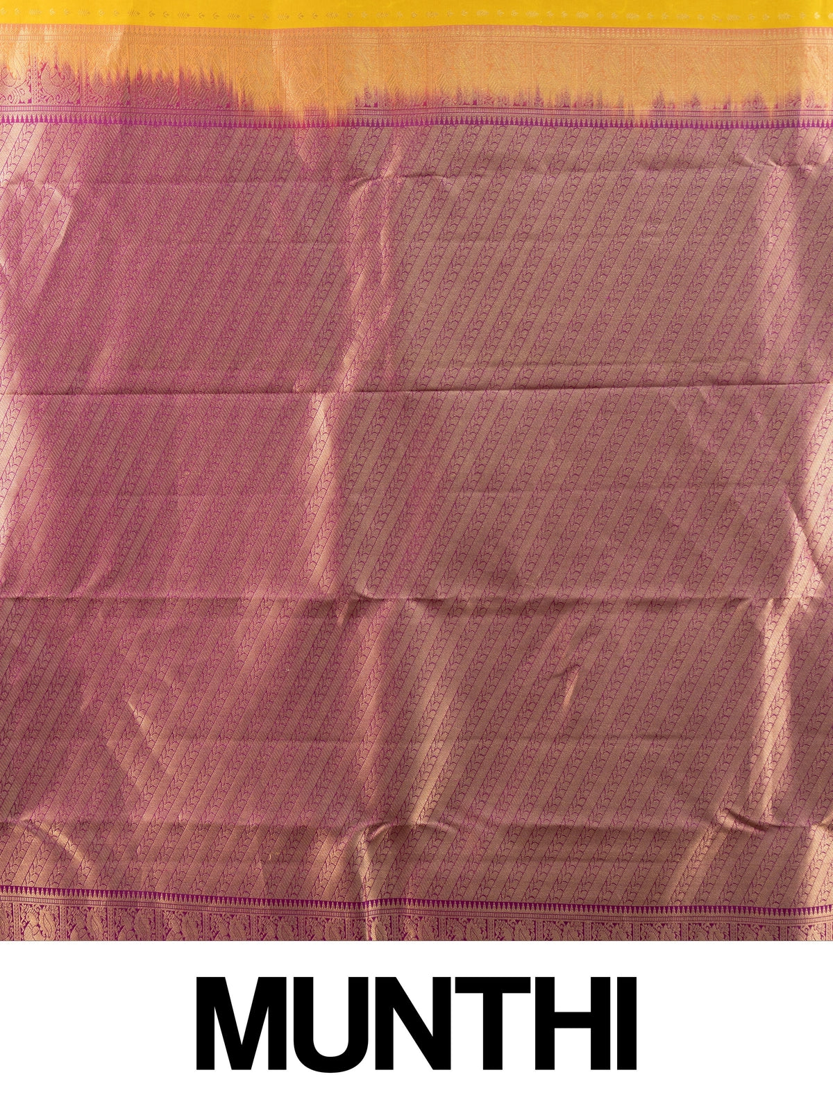 Mustard yellow pure Kanchipuram silk saree with magenta contrast gold zari border and pallu